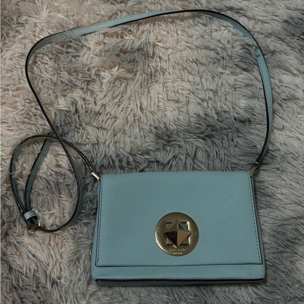 Kate Spade New York blue leather crossbody bag with gold hardware